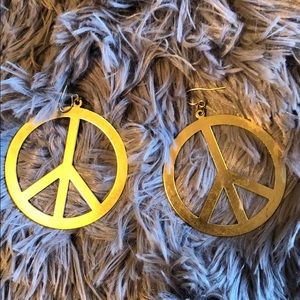 Gold peace sign earrings